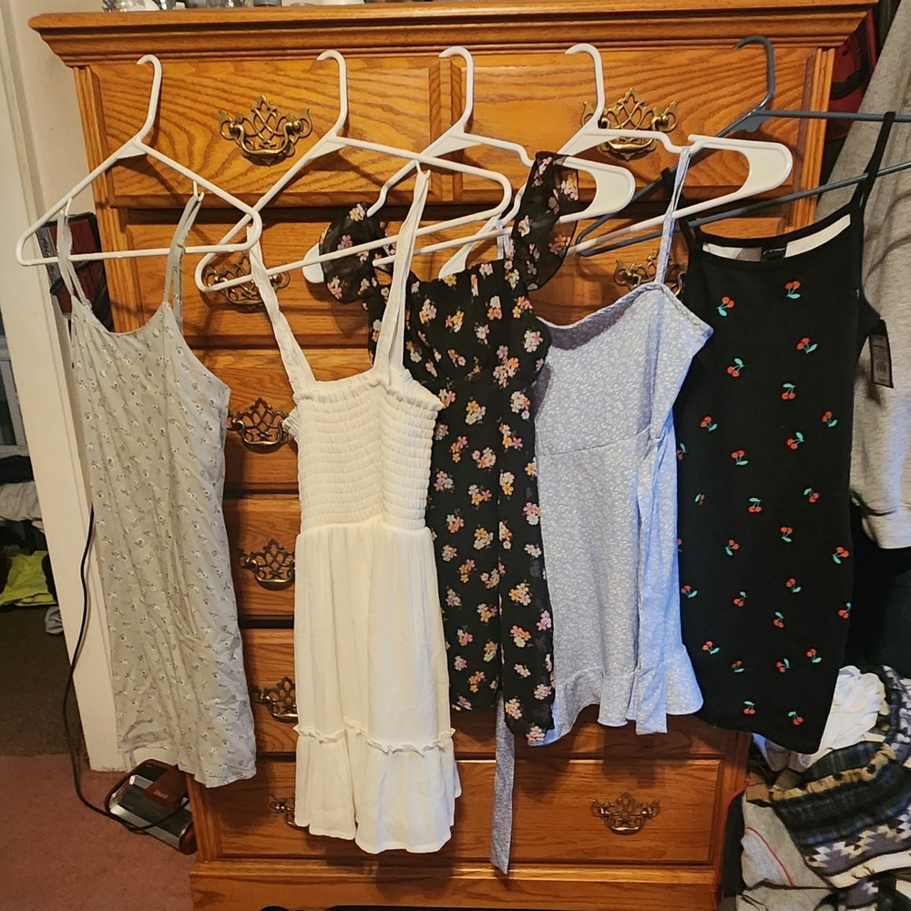 Green With Floral Flowers, White Sundress, Black With Floral Flowers and Black